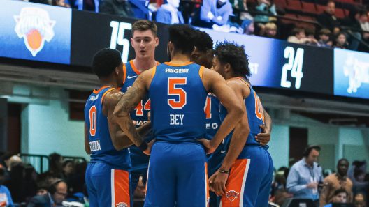 Westchester Knicks players Jamal Bey and Brandon Goodwin huddle up during NBA G League basketball game